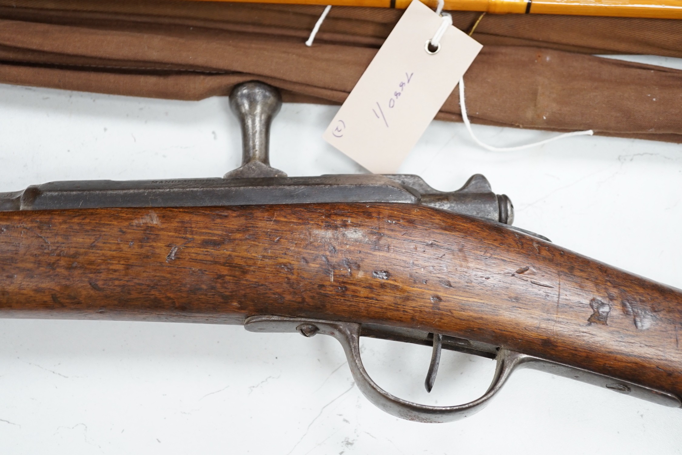 A 19th century French Chassepot bolt action rifle, manufactured by Darmes, St Etienne, MLE 1874, serial number 17767, barrel later engraved, together with a similar bayonet, serial number 67004